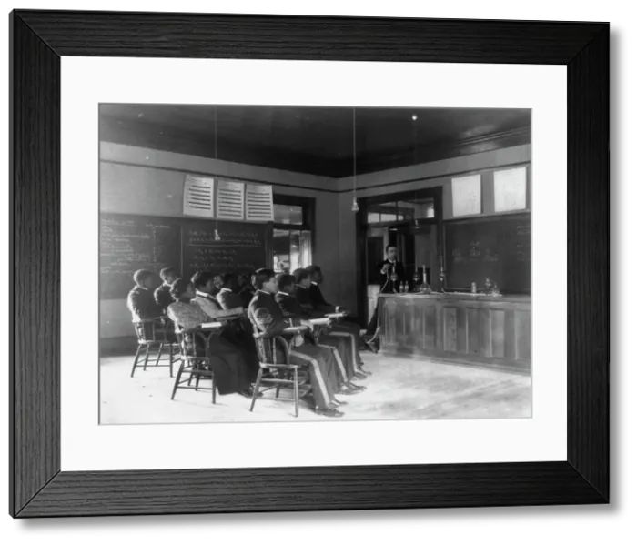 Framed Print : Students in class learning how to prepare sulphuric acid, Hampton Inst.. Va. between 1899 & 1900. Creator: Frances Benjamin Johnston. Students in class learning how to prepare sulphuric acid, Hampton Inst.. Va. between 1899 & 1900 Framed Print : Students in class learning how to prepare sulphuric acid, Hampton Inst.. Va. between 1899 & 1900. Creator: Frances Benjamin Johnston. Students in class learning how to prepare sulphuric acid, Hampton Inst.. Va. between 1899 & 1900