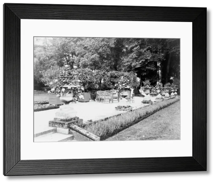 Framed Print : A Shaded gravelled terrace, screened by orange trees, with chaise longues... France, 1925. Creator: Frances Benjamin Johnston Framed Print : A Shaded gravelled terrace, screened by orange trees, with chaise longues... France, 1925. Creator: Frances Benjamin Johnston