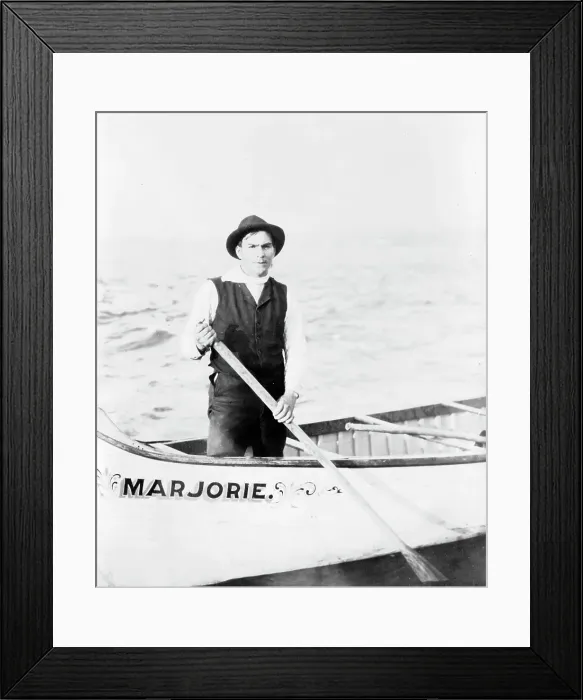 Framed Print : Indian guide for the rapids, standing in canoe, in the Sault Sainte Marie region of Michigan, 1903. Creator: Frances Benjamin Johnston Framed Print : Indian guide for the rapids, standing in canoe, in the Sault Sainte Marie region of Michigan, 1903. Creator: Frances Benjamin Johnston