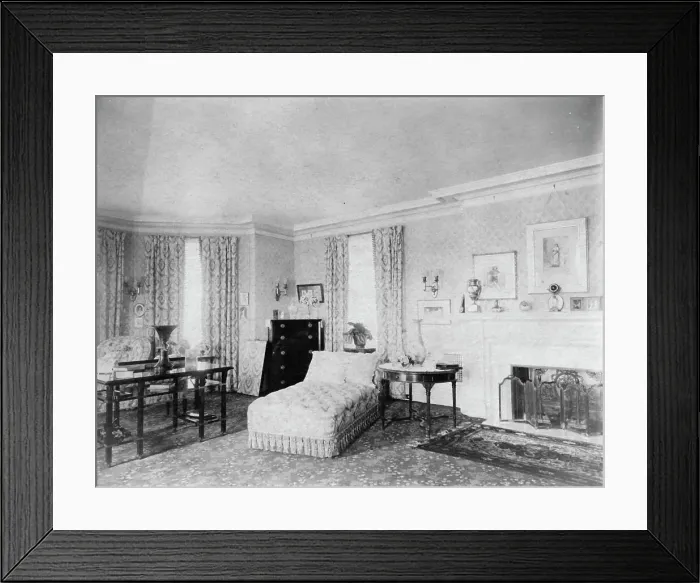 Framed Print : Bedroom with fireplace, and padded chaise longue, in home of...Greenwich, Connecticut, 1908. Creator: Frances Benjamin Johnston Framed Print : Bedroom with fireplace, and padded chaise longue, in home of...Greenwich, Connecticut, 1908. Creator: Frances Benjamin Johnston