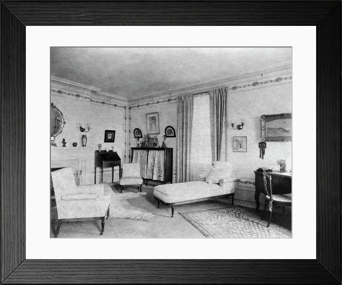Framed Print : Bedroom with fireplace, padded chaise longue, window, and polar... Greenwich, Connecticut, 1908. Creator: Frances Benjamin Johnston Framed Print : Bedroom with fireplace, padded chaise longue, window, and polar... Greenwich, Connecticut, 1908. Creator: Frances Benjamin Johnston