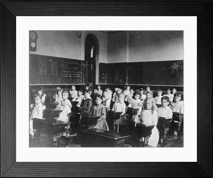 Framed Print : Girls and boys seated at desks in classroom, Washington, D.C. (1899?). Creator: Frances Benjamin Johnston Framed Print : Girls and boys seated at desks in classroom, Washington, D.C. (1899?). Creator: Frances Benjamin Johnston