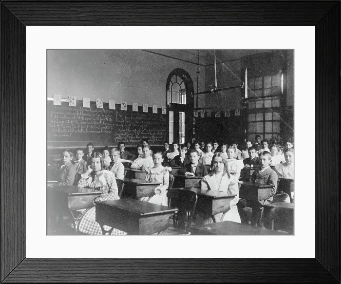 Framed Print : Girls and boys seated at desks in Washington, D.C. classroom, (1899?). Creator: Frances Benjamin Johnston Framed Print : Girls and boys seated at desks in Washington, D.C. classroom, (1899?). Creator: Frances Benjamin Johnston