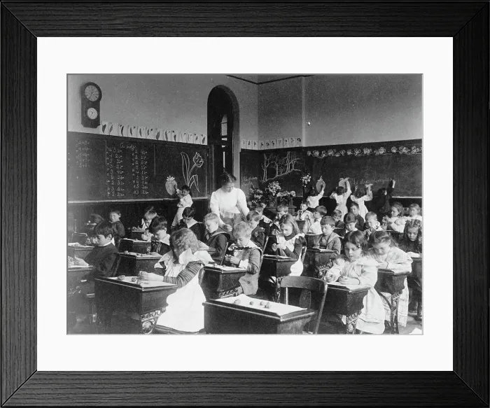 Framed Print : Children modeling clay at desks and drawing on blackboard in Washington, D.C. classroom, (1899?). Creator: Frances Benjamin Johnston