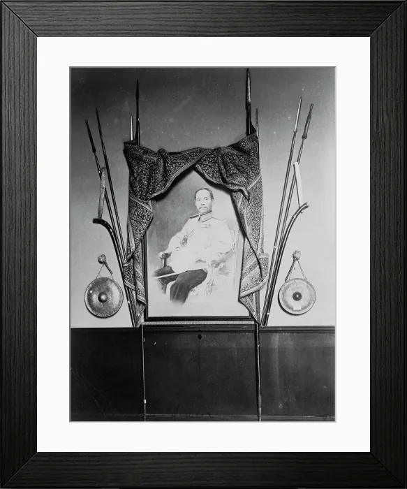 Framed Print : Display with portrait of a man, possibly Chulalongkorn, King of Siam, in Siam exhibit... 1904. Creator: Frances Benjamin Johnston Framed Print : Display with portrait of a man, possibly Chulalongkorn, King of Siam, in Siam exhibit... 1904. Creator: Frances Benjamin Johnston