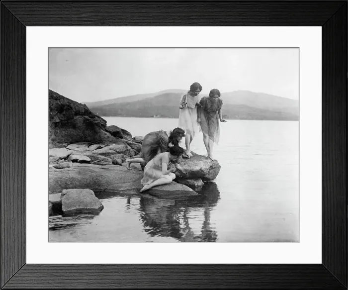 Framed Print : Four figures at water edge, c1914. Creator: Frances Benjamin Johnston Framed Print : Four figures at water edge, c1914. Creator: Frances Benjamin Johnston