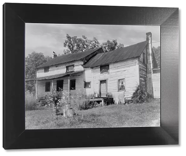 Log farmhouse, Roanoke County, Virginia, between 1900 and 1950. Creator: Frances Benjamin Johnston