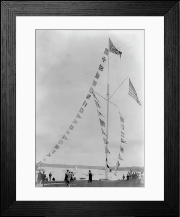 Framed Print : Pole with flags of different countries; sailboats in background, Oyster Bay, Long Island, N.Y. 1905 Creator: Frances Benjamin Johnston Framed Print : Pole with flags of different countries; sailboats in background, Oyster Bay, Long Island, N.Y. 1905 Creator: Frances Benjamin Johnston