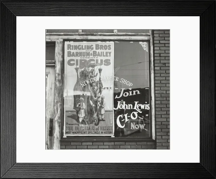 Framed Print : Barber shop window [with circus poster] in Birmingham, Alabama, 1937-01 - 1937-02. Creator: Arthur Rothstein
