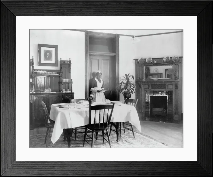 Framed Print : Serving the dinner, 1899 or 1900. Creator: Frances Benjamin Johnston Framed Print : Serving the dinner, 1899 or 1900. Creator: Frances Benjamin Johnston