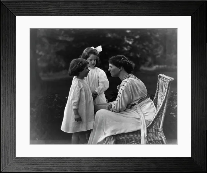 Framed Print : Mrs. Frank Vanderlip seated on porch, with two children, not after 1913. Creator: Frances Benjamin Johnston Framed Print : Mrs. Frank Vanderlip seated on porch, with two children, not after 1913. Creator: Frances Benjamin Johnston
