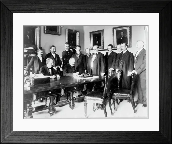 Framed Print : Ambassador Cambon signing the Peace Protocol, c1898. Creator: Frances Benjamin Johnston Framed Print : Ambassador Cambon signing the Peace Protocol, c1898. Creator: Frances Benjamin Johnston