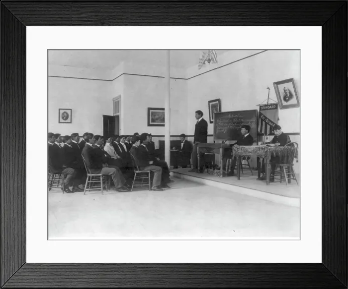 Framed Print : Men debating in class, Carlisle Indian School, Carlisle, Pennsylvania, 1901. Creator: Frances Benjamin Johnston Framed Print : Men debating in class, Carlisle Indian School, Carlisle, Pennsylvania, 1901. Creator: Frances Benjamin Johnston