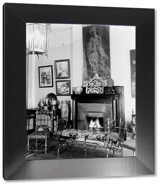 Fireplace, furniture, and works of art in Frances Benjamin Johnston's... New Orleans, c1920 - 1950. Creator: Frances Benjamin Johnston