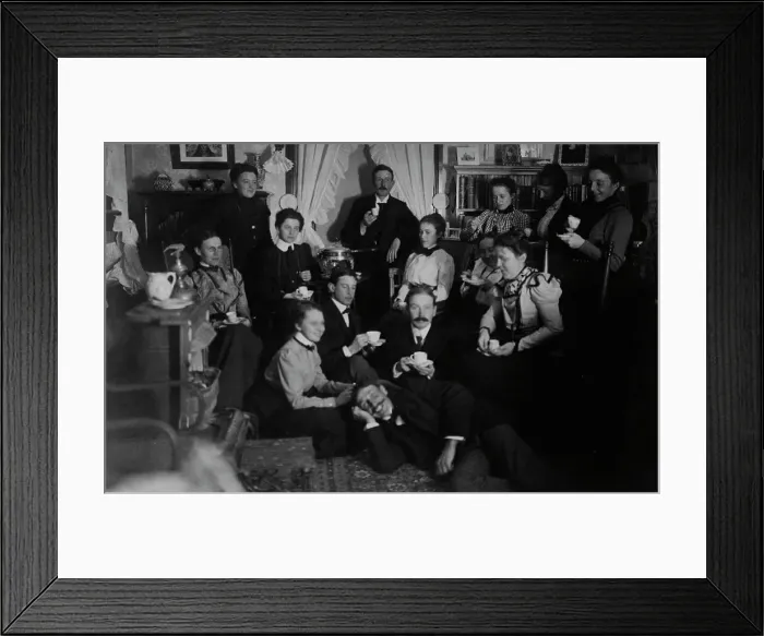 Framed Print : Group portrait of friends at social gathering, seated and standing with tea cups... c1890 - 1910. Creator: Frances Benjamin Johnston Framed Print : Group portrait of friends at social gathering, seated and standing with tea cups... c1890 - 1910. Creator: Frances Benjamin Johnston