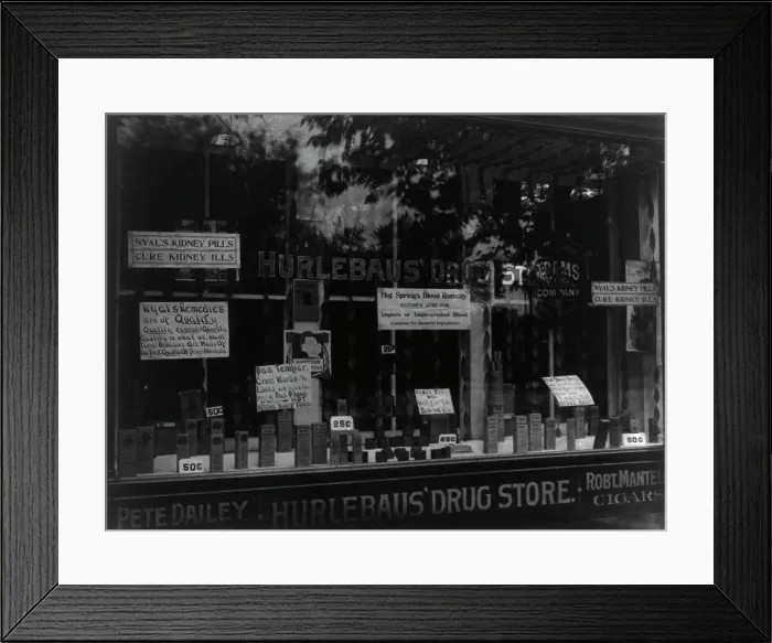 Framed Print : Front window - Hurlebaus Drug Store, c1900. Creator: Frances Benjamin Johnston Framed Print : Front window - Hurlebaus Drug Store, c1900. Creator: Frances Benjamin Johnston