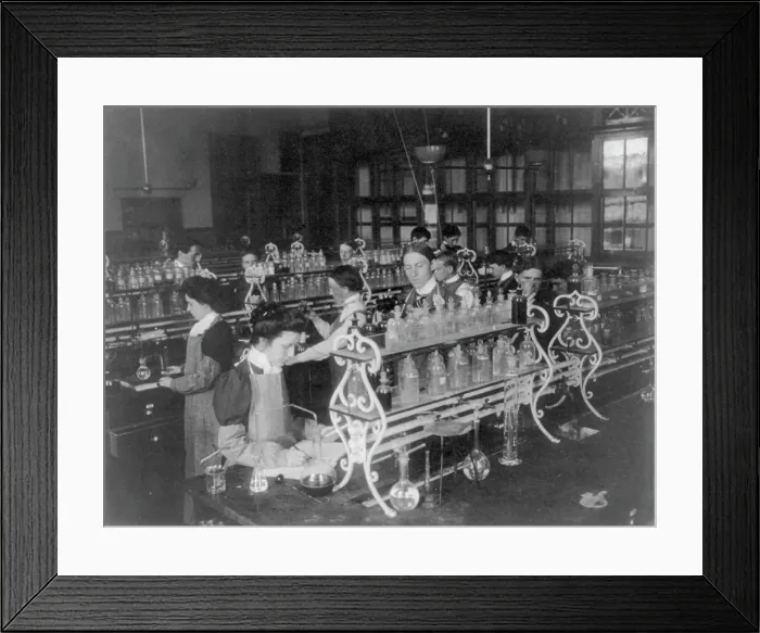 Framed Print : Students in a chemistry class conducting an experiment, Western High School, Washington DC, (1899?). Creator: Frances Benjamin Johnston Framed Print : Students in a chemistry class conducting an experiment, Western High School, Washington DC, (1899?). Creator: Frances Benjamin Johnston