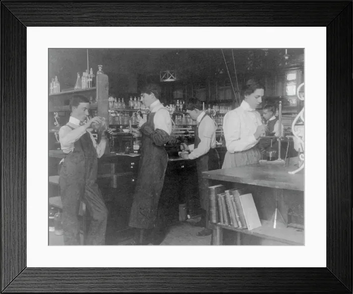 Framed Print : Students in a chemistry class conducting an experiment, Western High School, Washington DC, (1899?). Creator: Frances Benjamin Johnston Framed Print : Students in a chemistry class conducting an experiment, Western High School, Washington DC, (1899?). Creator: Frances Benjamin Johnston