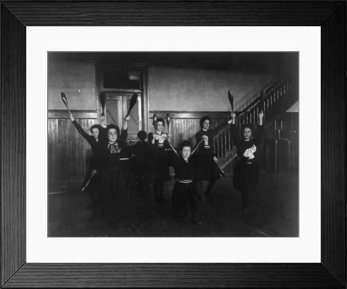 Framed Print : Female students exercising with bowling pins, Western High School, Washington, D.C. (1899?). Creator: Frances Benjamin Johnston Framed Print : Female students exercising with bowling pins, Western High School, Washington, D.C. (1899?). Creator: Frances Benjamin Johnston