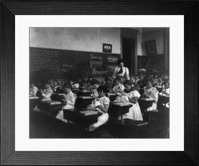 Framed Print : School girls in sewing class, (1899?). Creator: Frances Benjamin Johnston Framed Print : School girls in sewing class, (1899?). Creator: Frances Benjamin Johnston