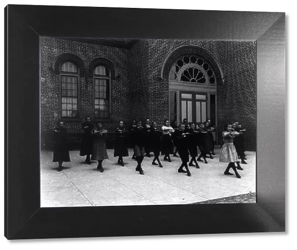 Calisthenics or dance class, outdoors, 3rd Division, (1899?). Creator: Frances Benjamin Johnston