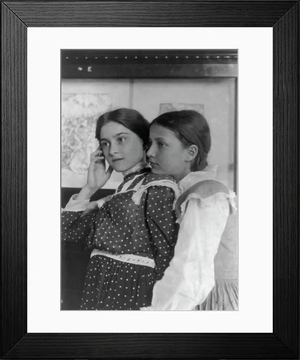 Framed Print : Two girls from a Washington, D.C. school on a class visit to the Library of Congress... (1899?). Creator: Frances Benjamin Johnston