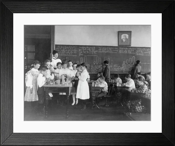 Framed Print : Classroom scene in Washington, D.C. elementary school - children working with blocks... (1899?). Creator: Frances Benjamin Johnston Framed Print : Classroom scene in Washington, D.C. elementary school - children working with blocks... (1899?). Creator: Frances Benjamin Johnston