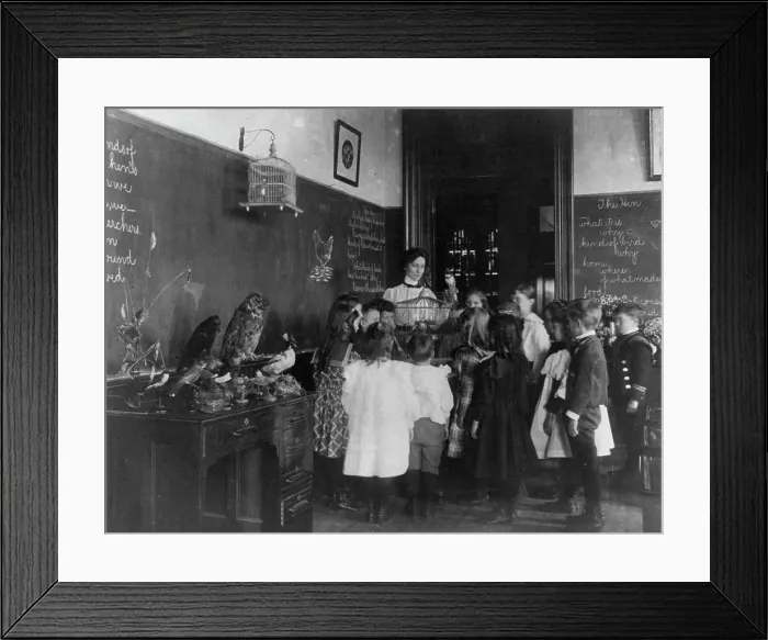 Framed Print : Teacher and group of grade school children standing around bird cage and... Washington DC, (1899?). Creator: Frances Benjamin Johnston Framed Print : Teacher and group of grade school children standing around bird cage and... Washington DC, (1899?). Creator: Frances Benjamin Johnston
