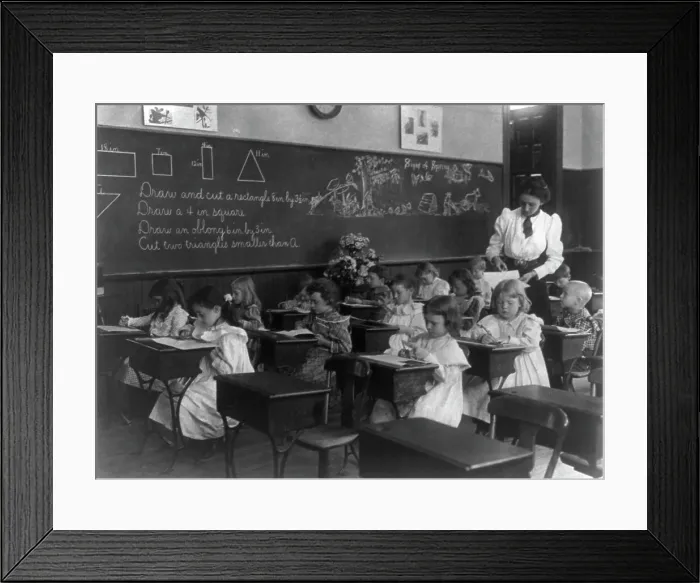 Framed Print : Grade school, Washington, D.C. - children drawing and cutting rectangles, triangles, etc. (1899?). Creator: Frances Benjamin Johnston Framed Print : Grade school, Washington, D.C. - children drawing and cutting rectangles, triangles, etc. (1899?). Creator: Frances Benjamin Johnston