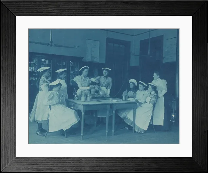 Framed Print : Eight teenage girls wearing aprons and chef caps learning to cook...Washington DC high school, 1899? Creator: Frances Benjamin Johnston Framed Print : Eight teenage girls wearing aprons and chef caps learning to cook...Washington DC high school, 1899? Creator: Frances Benjamin Johnston
