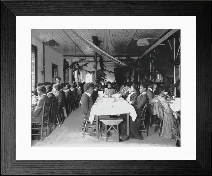 Framed Print : Interior view of dining hall, decorated for the holidays, with students... Tuskegee Institute, c1902 Creator: Frances Benjamin Johnston Framed Print : Interior view of dining hall, decorated for the holidays, with students... Tuskegee Institute, c1902 Creator: Frances Benjamin Johnston