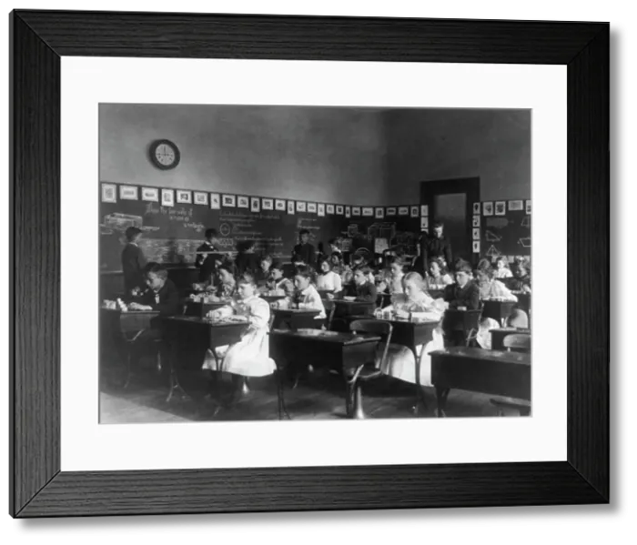 Framed Print : Children in school in Washington, D.C. - studying geometry, (1899?). Creator: Frances Benjamin Johnston Framed Print : Children in school in Washington, D.C. - studying geometry, (1899?). Creator: Frances Benjamin Johnston