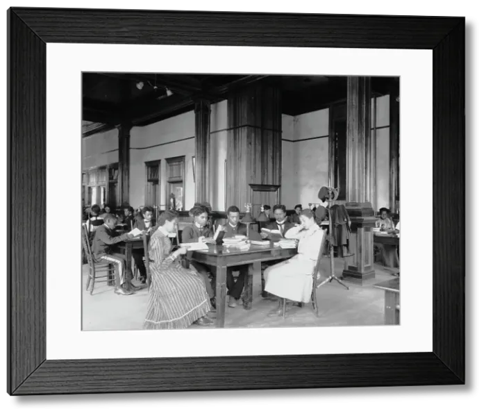 Framed Print : Interior view of library reading room with male and female students... Tuskegee Institute, c1902. Creator: Frances Benjamin Johnston Framed Print : Interior view of library reading room with male and female students... Tuskegee Institute, c1902. Creator: Frances Benjamin Johnston