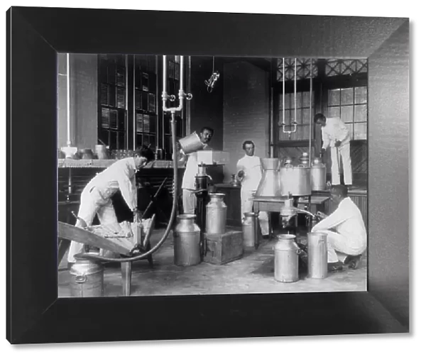 Five men making butter in a class at Hampton Institute, Hampton, Va. 1899 or 1900. Creator: Frances Benjamin Johnston
