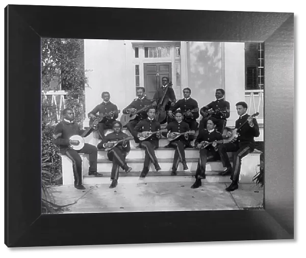 Hampton Institute, Hampton, Va. ca. 1898 - 11 students in uniform playing guitars... 1899 or 1900. Creator: Frances Benjamin Johnston