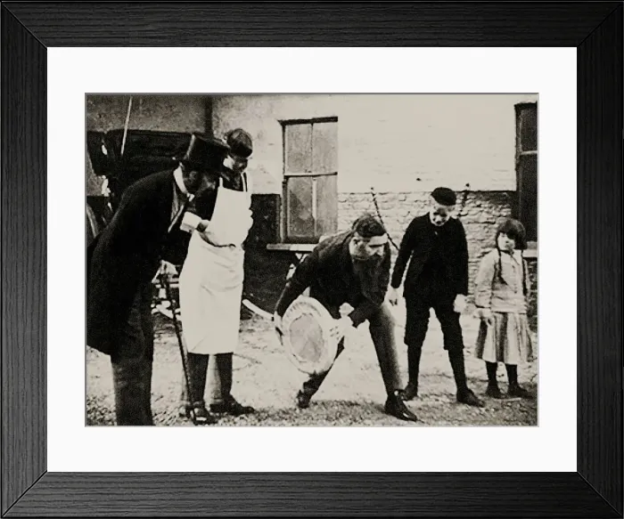 Framed Print : John Boyd Dunlop experiments with his pneumatic tire wheel, End of 1880s. Creator: Anonymous Framed Print : John Boyd Dunlop experiments with his pneumatic tire wheel, End of 1880s. Creator: Anonymous