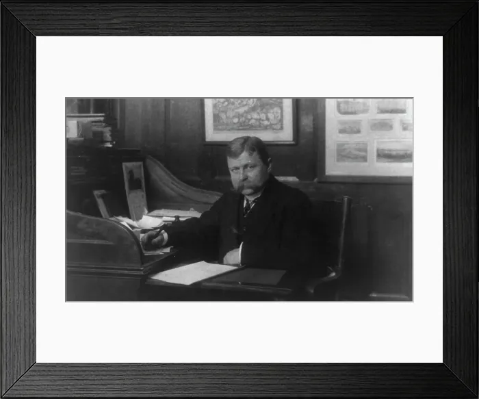 Framed Print : Man (banker?) seated at desk in American Security and Trust Co. Washington, D.C. c1890 - c1950. Creator: Frances Benjamin Johnston Framed Print : Man (banker?) seated at desk in American Security and Trust Co. Washington, D.C. c1890 - c1950. Creator: Frances Benjamin Johnston