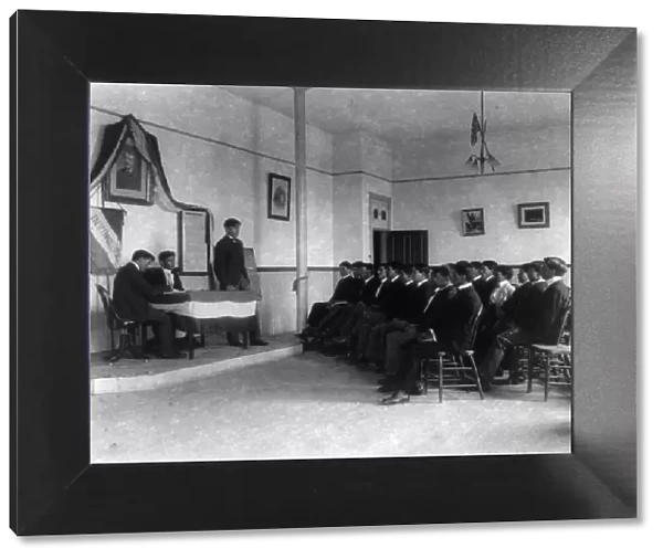 Carlisle Indian School, Carlisle, Pa. Classroom debate by debating society, 1901. Creator: Frances Benjamin Johnston