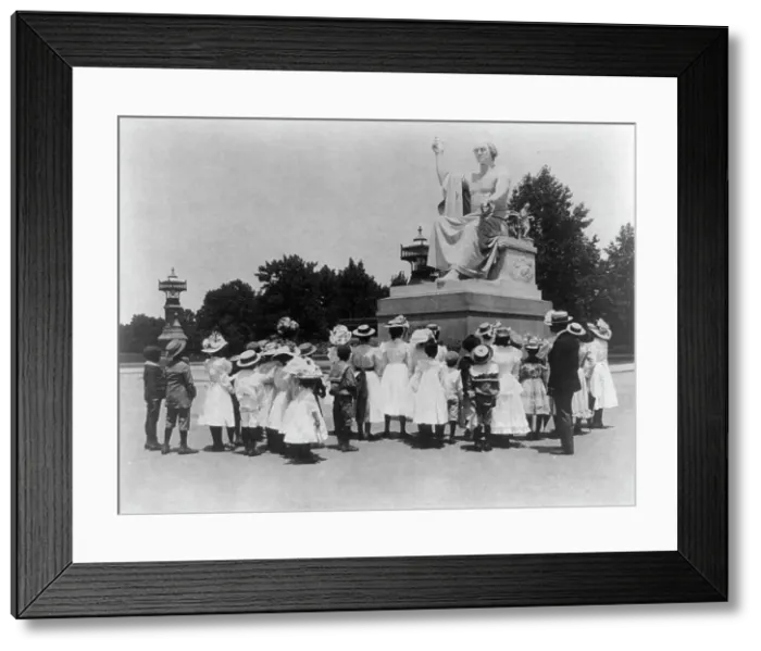 Framed Print : African American school children facing the Horatio Greenough statue of George Washing... (1899?). Creator: Frances Benjamin Johnston Framed Print : African American school children facing the Horatio Greenough statue of George Washing... (1899?). Creator: Frances Benjamin Johnston