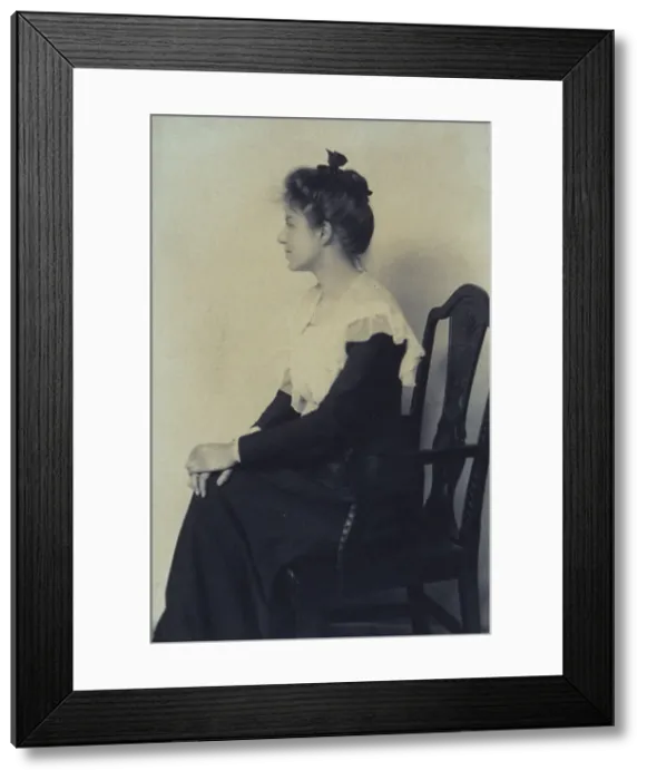 Framed Print : Profile portrait of a woman seated in chair, facing left with hands on her knees, c1900. Creator: Misses Selby Framed Print : Profile portrait of a woman seated in chair, facing left with hands on her knees, c1900. Creator: Misses Selby