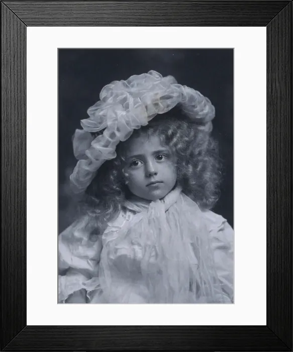 Framed Print : Portrait of little girl in frilly hat, c1900. Creator: Addie Kilburn Robinson Framed Print : Portrait of little girl in frilly hat, c1900. Creator: Addie Kilburn Robinson