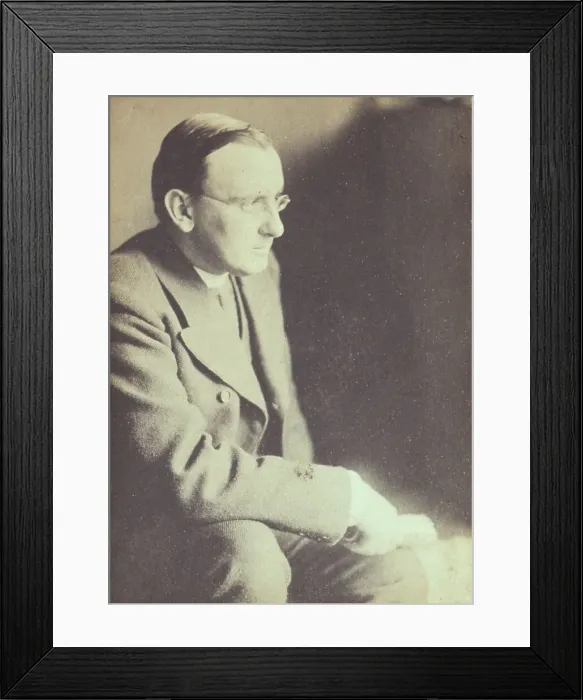 Framed Print : Portrait of man wearing glasses, seated with elbow resting on right knee, c1900. Creator: Eva Watson-Schutze Framed Print : Portrait of man wearing glasses, seated with elbow resting on right knee, c1900. Creator: Eva Watson-Schutze
