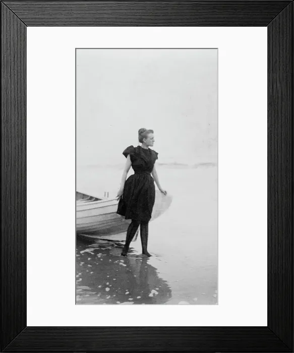 Framed Print : Frances Benjamin Johnston, full-length portrait, standing at edge of ocean, in... c1880 - 1900. Creator: Unknown Framed Print : Frances Benjamin Johnston, full-length portrait, standing at edge of ocean, in... c1880 - 1900. Creator: Unknown