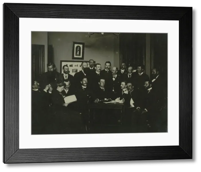 Framed Print : Frances Benjamin Johnston, seated in profile at left, group portrait with 18... c1880 - 1900. Creator: Frances Benjamin Johnston Framed Print : Frances Benjamin Johnston, seated in profile at left, group portrait with 18... c1880 - 1900. Creator: Frances Benjamin Johnston