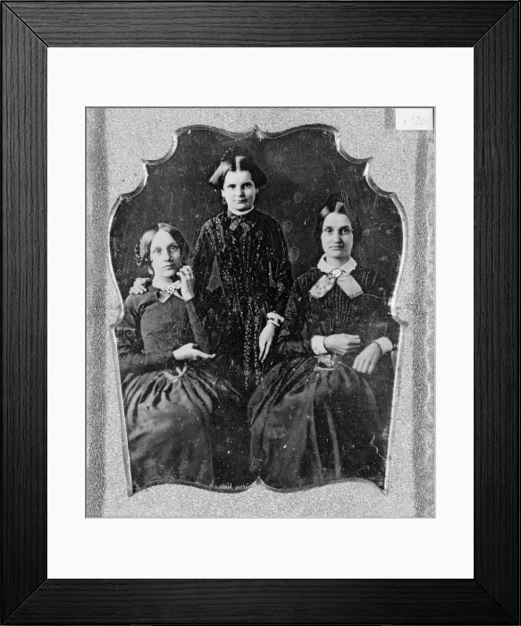 Framed Print : Three unidentified women, two seated, one standing, facing front, between 1840 and 1860. Creator: Unknown