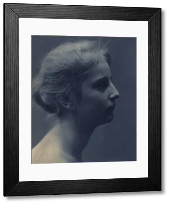 Framed Print : Young woman, facing right, head-and-shoulders profile portrait, c1900. Creator: Unknown Framed Print : Young woman, facing right, head-and-shoulders profile portrait, c1900. Creator: Unknown