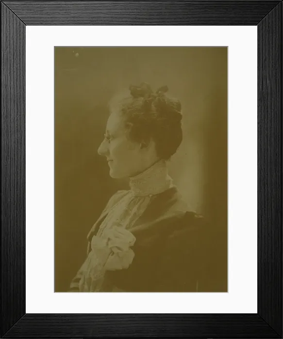 Framed Print : Studio portrait of young woman in white dress posed as if holding flowering tree branch, c1900. Creator: Unknown Framed Print : Studio portrait of young woman in white dress posed as if holding flowering tree branch, c1900. Creator: Unknown