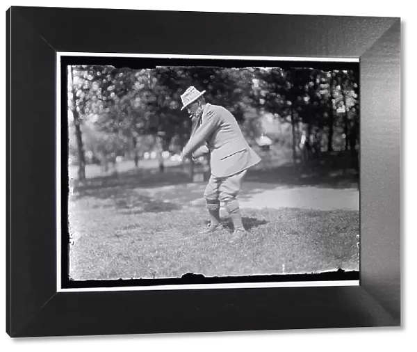 Walter Travis playing golf, between 1909 and 1914. Creator: Harris & Ewing. Walter Travis playing golf, between 1909 and 1914. Creator: Harris & Ewing