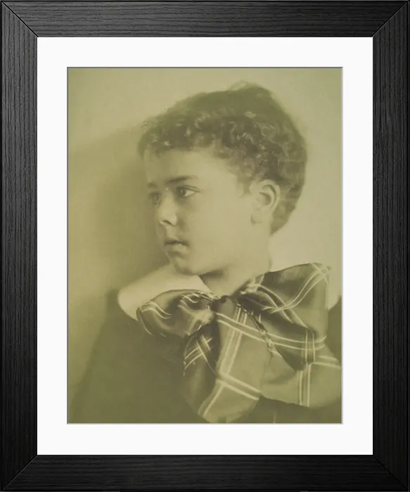 Framed Print : Head-and-shoulders portrait of a young boy with a large plaid bow at the neck of his... c1900. Creator: Horace L Bundy Framed Print : Head-and-shoulders portrait of a young boy with a large plaid bow at the neck of his... c1900. Creator: Horace L Bundy