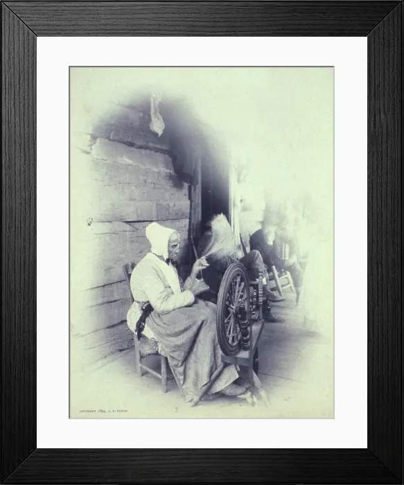 Framed Print : Elderly woman sitting on porch spinning, c1894. Creator: Charles Richards Dodge Framed Print : Elderly woman sitting on porch spinning, c1894. Creator: Charles Richards Dodge